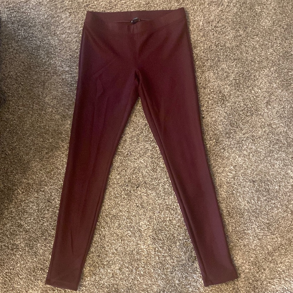 Express burgundy faux leather leggings